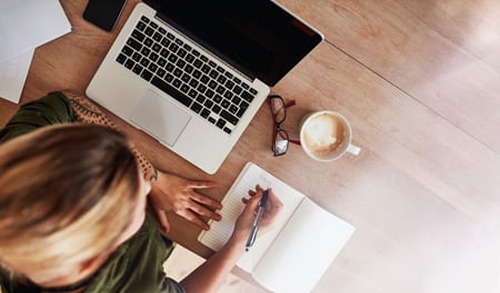 Woman writing case study